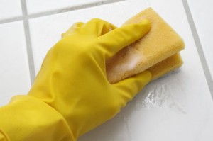 Hand in glove with sponge