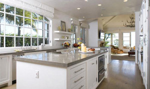 Spotlights light up a modern kitchen.