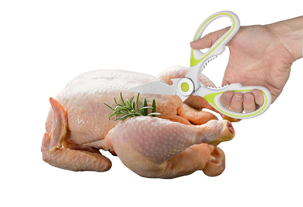 kitchen shears cutting chicken